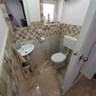 Although small, the bathroom is efficiently designed.