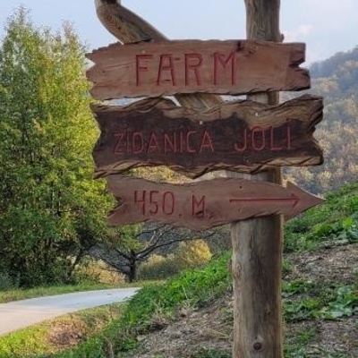 A country road leads to the cottage.