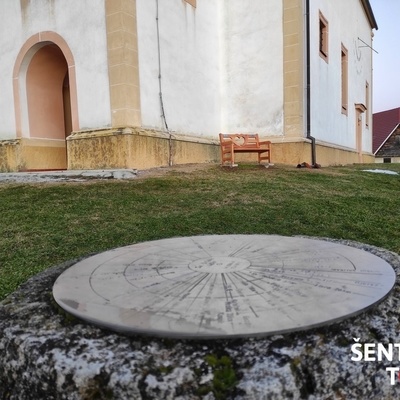 On Sv. Uršula Hill above Dramlje, the Bench of Love stands next to the church.